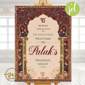 May include: A rectangular wedding welcome sign featuring a cream-coloured centre with dark red and gold floral borders. The text reads: Sat Sri Akal, Vadhaiyan Sareya Nu, The Ahuja Family, Welcome To Palak's Wedding Night, with a green circular logo.