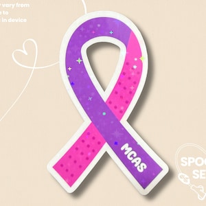 May include: A ribbon-shaped sticker with a purple and pink gradient and a white border. The text "MCAS" is printed on the ribbon. The sticker has a sparkly design with the text "SPOONIE SETS" in the bottom right corner.