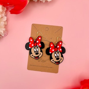 Minnie:
--- Width 1.4 inches
--- Length 1.7 inches
--- Drop length 2.2 inches