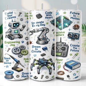 Könnte beinhalten: Ein weißer zylindrischer Becher mit einem bunten Aufdruck zum Thema Technik, der Roboter, Leiterplatten, Zahnräder und elektronische Bauteile zeigt. Der Text umfasst Build Your Dreams, Code With Heart, Innovate Every Day und Create The Future.