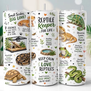 May include: A white cylindrical tumbler featuring colourful illustrations of various reptiles including a leopard gecko, bearded dragon, frog, snake, and tortoise, alongside text such as "Reptile Keeper For Life" and "Small Scales, Big Love!" with small decorative icons.