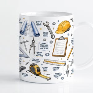 May include: A white ceramic mug featuring a colourful pattern of construction and engineering tools including a yellow hard hat, tape measure, wrench, clipboard, blueprints, and various drafting instruments, interspersed with motivational text.