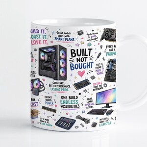 May include: A white ceramic mug featuring a colourful graphic print of computer hardware components, including a PC tower, motherboard, and monitor, alongside motivational text like "Built Not Bought" and "One Build Endless Possibilities."