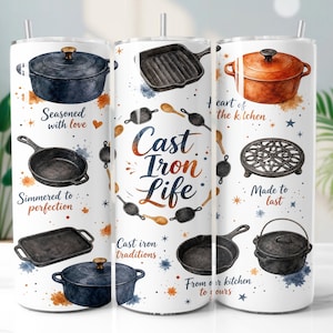 May include: A white cylindrical tumbler featuring a watercolour print of various black and orange cast iron cookware, including skillets, Dutch ovens, and a trivet. The text reads Cast Iron Life, Seasoned with love, Simmered to perfection, Heart of the kitchen, Made to last, Cast iron traditions, and From our kitchen to yours.