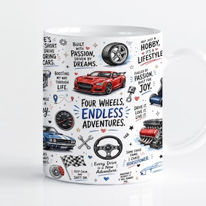 May include: A white ceramic mug featuring a colourful collage of automotive illustrations including a red sports car, a blue muscle car, a tyre, a steering wheel, a chequered flag, and engine parts, with text reading Four Wheels, Endless Adventures.