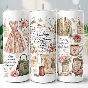May include: A white cylindrical tumbler featuring a vintage-themed collage of a floral dress, a green handbag, a jacket, a coffee mug, sewing patterns, and spools of thread. Text includes "Vintage Clothing Life," "One person's trash is my treasure."