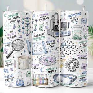 May include: A white cylindrical tumbler featuring a colourful science-themed print with illustrations of a microscope, magnifying glass, test tubes, beakers, and chemical structures, accompanied by text including Explore the Atomic World and Innovating for the Future.