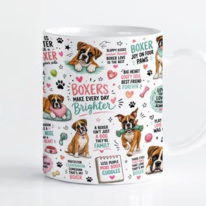May include: A white ceramic mug featuring a repeating pattern of brown and white Boxer dog illustrations, pink hearts, paw prints, and various phrases including Boxers Make Every Day Brighter, Less People More Boxer Cuddles, and Big Heart Goofy Soul.