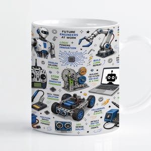 Może przedstawiać: Biały ceramiczny kubek z kolorowym nadrukiem o tematyce inżynieryjnej, przedstawiający roboty, ramię robotyczne, laptopa, koła zębate i komponenty elektroniczne. Tekst zawiera hasła takie jak Future Engineers At Work oraz Build Learn Repeat.