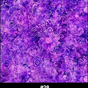 May include: A vibrant purple fabric with a floral and swirling pattern. The design features large, stylized flowers and delicate, curving lines in shades of purple and white. The text "#28 Purple" is at the bottom.