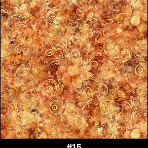 May include: Pale golden fabric with a floral pattern. The design features large flowers and swirling vines in shades of gold and brown. The fabric has a textured appearance. The text at the bottom reads "#15 Pale Golden".