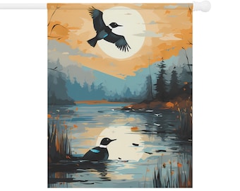 May include: A painting of a lake scene with a bird flying over the water and another bird swimming in the water. The sky is a light orange color and the water is a light blue color. The trees are a dark green color.