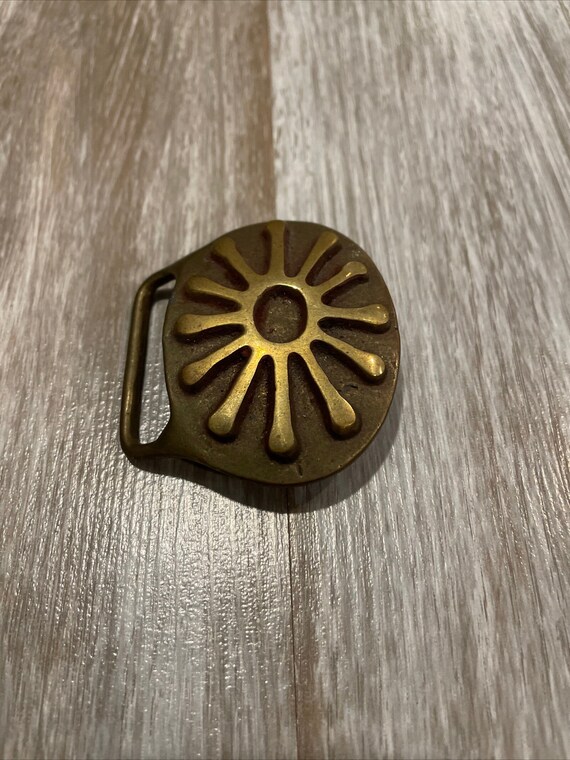 1970s brass belt buckle Gem