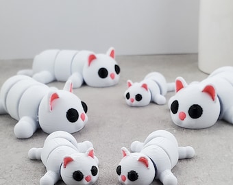 Gatos y gatitos articulados impresos en 3D