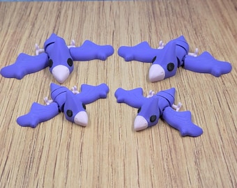 Juguete antiestrés con forma de pterodáctilo articulado impreso en 3D