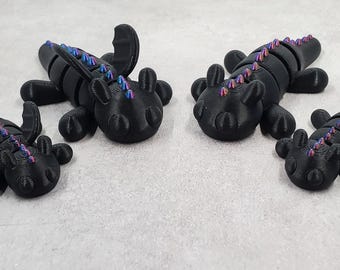 3D Printed Articulating Black Dragon with Colorful Spikes Fidget Toy
