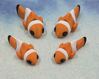 Juguete antiestrés con forma de pez payaso articulado impreso en 3D
