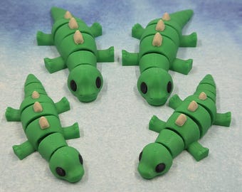 Juguete antiestrés de brontosaurio articulado impreso en 3D