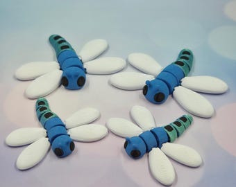 Juguete antiestrés de libélula articulada impreso en 3D