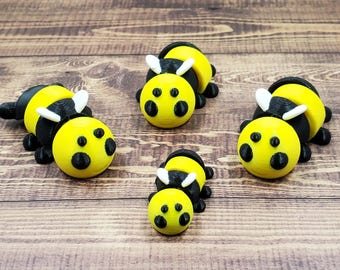 Juguete antiestrés articulado con forma de abeja impreso en 3D