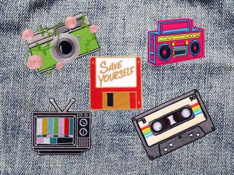 May include: A set of five iron-on patches featuring a vintage camera, a cassette tape, a retro TV, a boombox, and a floppy disk with the text "Save Yourself".