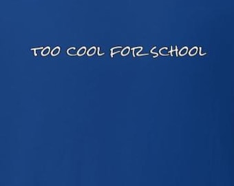 May include: A royal blue t-shirt with the phrase "TOO COOL FOR SCHOOL" printed in white, centered on the chest. The shirt has a crew neck and short sleeves. The fabric appears to be a soft, comfortable material.