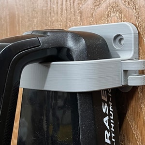 Bissell PetHairEraser cordless vacuum wall mount