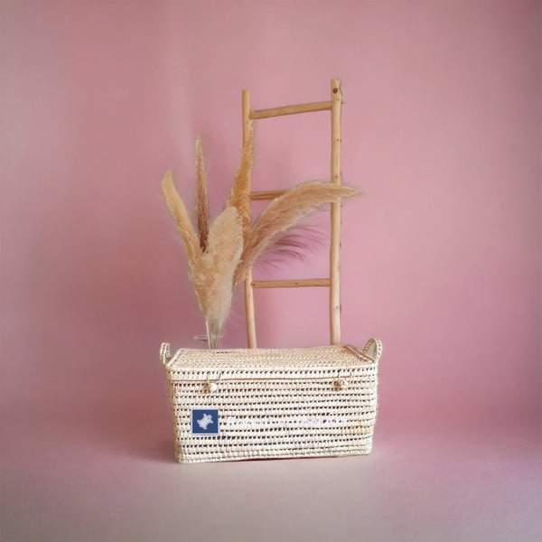 A storage trunk made of wicker - Palm leaf storage basket.