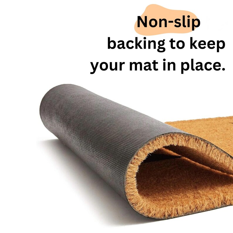 May include: Close-up of a rolled-up doormat with a dark gray non-slip backing and a natural brown coir surface. The text "Non-slip backing to keep your mat in place" is visible in the image.