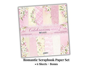 Op de afbeelding: Een set scrapbookpapier getiteld Celebrations Rouge 2 met diverse roze en crèmekleurige patronen, waaronder bloemenprints, ruiten en kantontwerpen. De omslag toont de tekst Celebrations Rouge 2, ScrapAndMe, Design Nadiia Szpunar en Flowers Painting Anna Lipowska.