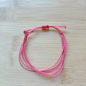 wax string pink bracelet!