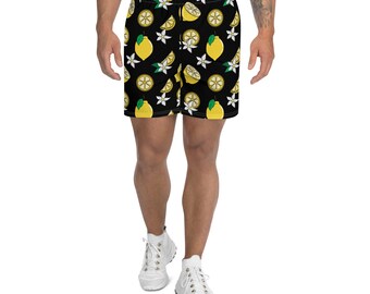 May include: Black athletic shorts with a lemon print. The lemons are yellow with green leaves and white flowers.
