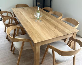 Handmade Oak set of dining table and 8 chairs.
