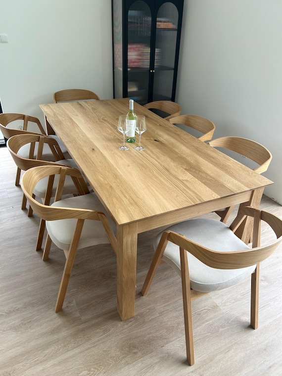 Handmade Oak set of dining table and 8 chairs.