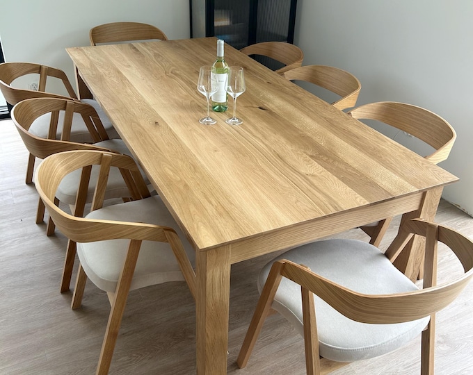 Handmade Oak set of dining table and 8 chairs.