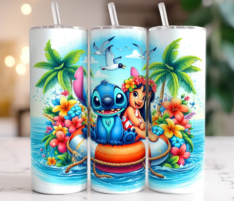 May include: A set of three white tumblers with a blue and green tropical island scene featuring Stitch and Angel from Lilo & Stitch. The tumblers have a blue and green tropical island scene with palm trees, flowers, and a surfboard.