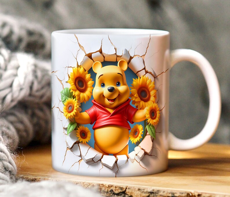 May include: White ceramic mug with a Winnie the Pooh character design. Pooh Bear is peeking out of a cracked wall with sunflowers surrounding him.