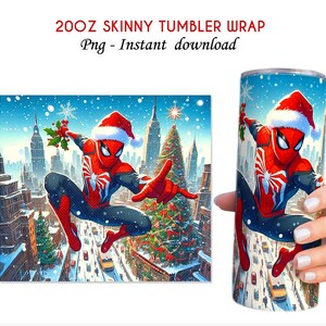 May include: A 20oz skinny tumbler wrap with a festive design. It features Spider-Man in a Santa hat, set against a snowy cityscape with a Christmas tree. The text "20OZ SKINNY TUMBLER WRAP" and "Png - Instant download" is visible.