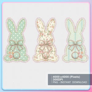 May include: Three Easter bunny cutouts in pastel colors. The bunnies have lace trim, bows, and floral accents. One is mint green with white polka dots, another has a floral pattern, and the third is light blue with stripes.