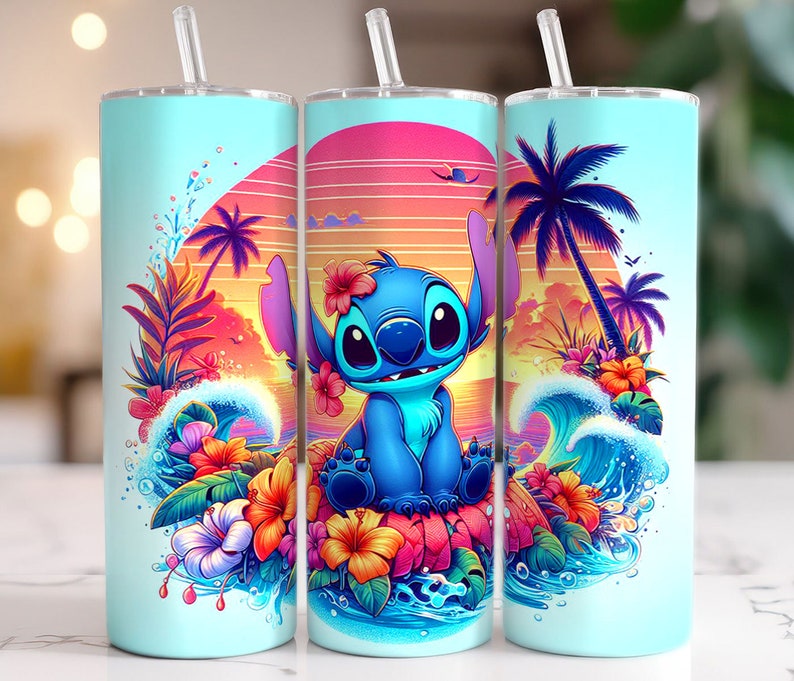 May include: A light blue tumbler featuring a cartoon character with a tropical sunset design. The character is blue with large eyes and is surrounded by waves, flowers, and palm trees. The tumbler includes a clear straw.