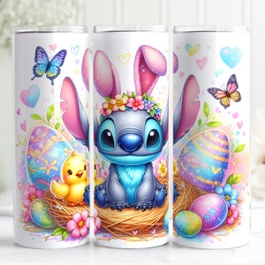 May include: A blue and gray Stitch character wearing a flower crown and bunny ears, holding a pastel Easter egg. The character is sitting in a nest with a yellow chick and surrounded by pastel Easter eggs and butterflies.