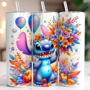 May include: A white tumbler featuring a blue Stitch character from Lilo & Stitch. Stitch is holding a bouquet of colourful flowers and balloons. The tumbler has a straw and is decorated with a watercolour-style background.