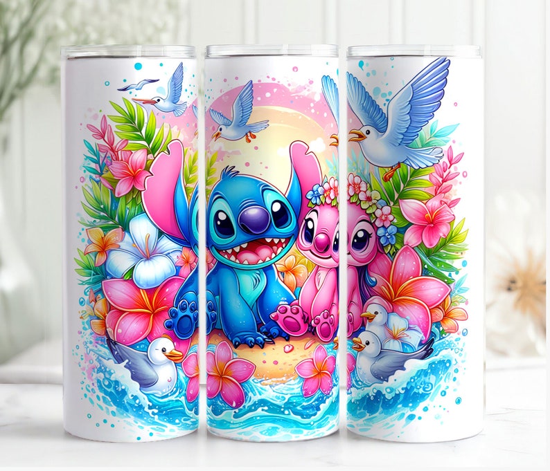 May include: A set of three white tumblers with a colorful design featuring Stitch and Angel from Lilo & Stitch. The design includes tropical flowers, seagulls, and ocean waves.