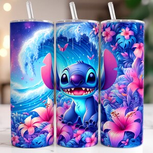May include: Three stainless steel tumblers with lids and straws. The tumblers feature a colorful design with a blue Stitch character from Lilo & Stitch, pink and purple flowers, and a blue wave pattern.