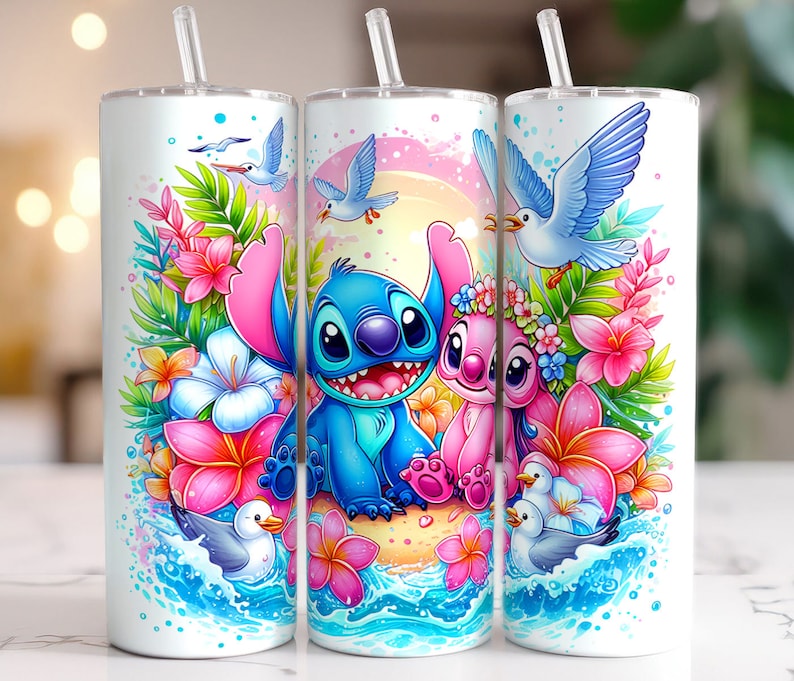 May include: A white tumbler with a blue and pink cartoon image of Stitch and Angel from Lilo & Stitch. The image is surrounded by tropical flowers and seagulls. The tumbler has a straw.