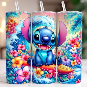 May include: A blue and white Stitch character from Lilo & Stitch is riding a surfboard on a wave with pink, yellow, and blue tropical flowers. The image is on a tumbler with a pink lid and a straw.