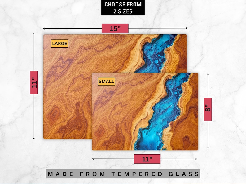May include: Two cutting boards made of tempered glass with a wood grain pattern and a blue resin river running through the center. The larger board is 15 inches by 11 inches and the smaller board is 11 inches by 8 inches.