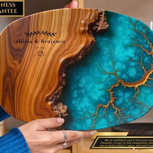 May include: A wooden serving tray with a turquoise and gold resin inlay. The tray is engraved with the text "Olivia & Benjamin est. 2021".