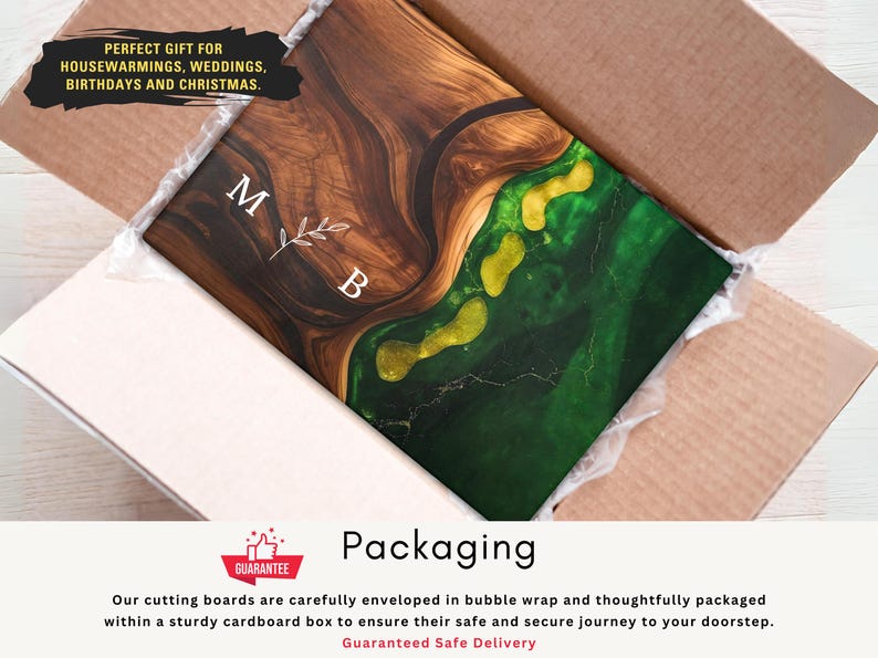 Puede incluir: Una tabla de cortar de madera con un dise&ntilde;o de resina epoxi marr&oacute;n oscuro y verde, personalizada con las iniciales "M B". La tabla est&aacute; empaquetada en una caja de cart&oacute;n, lista para regalar. El texto "PERFECT GIFT" es visible.