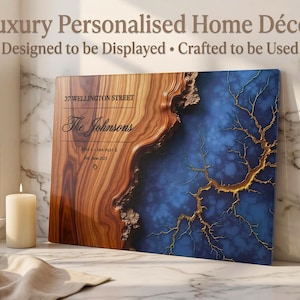 May include: Personalized home decor sign with a wood and blue resin design. The sign includes the text "37 WELLINGTON STREET" and "The Johnsons". The sign is designed to be displayed and crafted to be used.